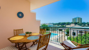Glamorous 1BDR Apartment w/ Balcony and Pool by LovelyStay